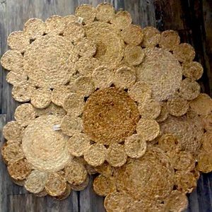 Jute place mats. ( flower shape) 
8 of them. New